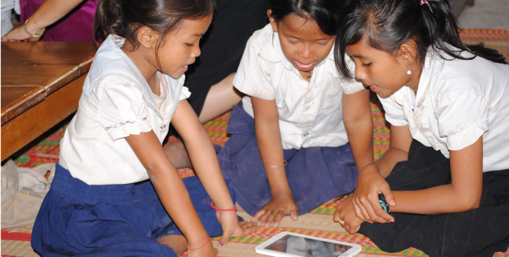 Cambodian girls with tablet